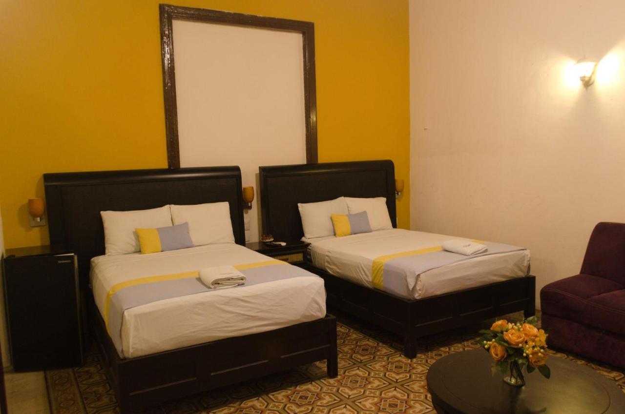Hotel Real San Juan Suites Merida Bagian luar foto